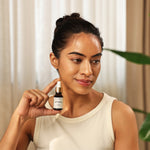 Art of Vedas Nasya Oil Authentic Ayurveda - Woman Holding Ayurvedic Nasya Oil Dropper for Nasal Care and Clarity